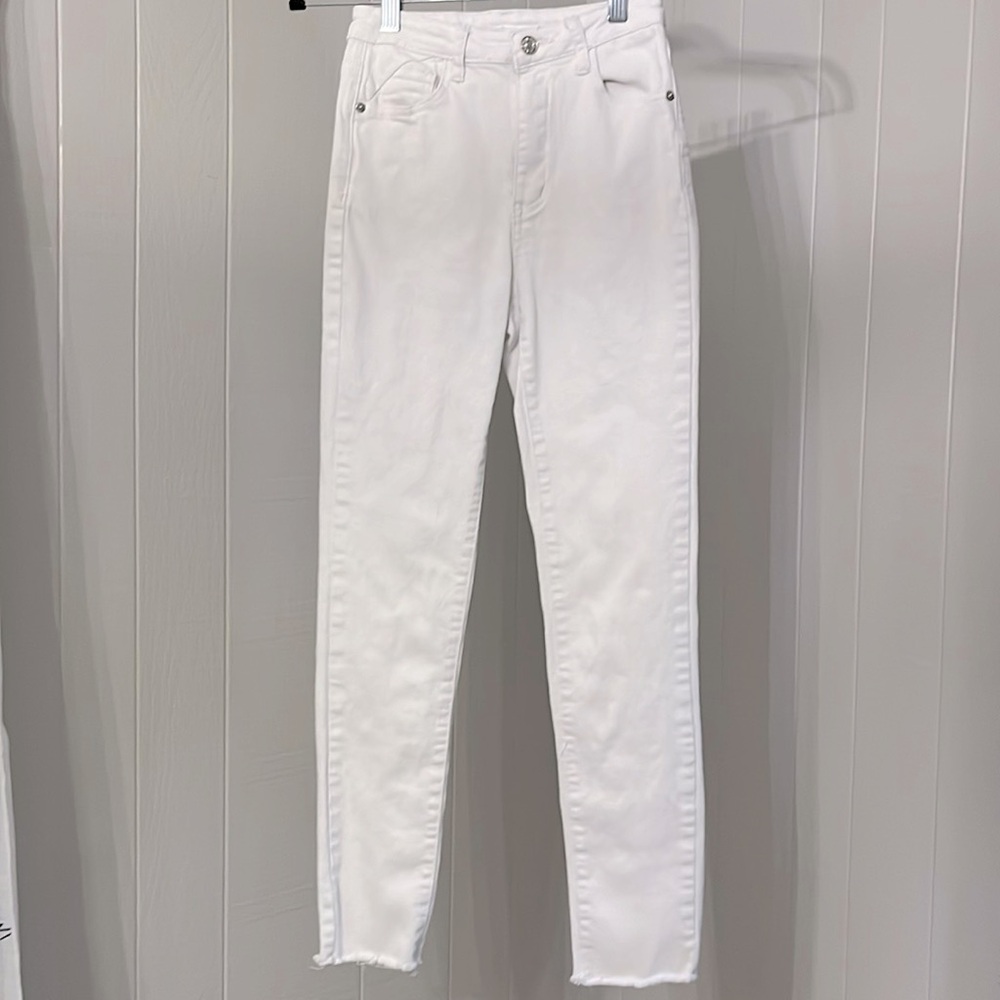 white skinny jeans , size xxs